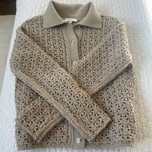 Excellent condition. Never worn. Gorgeous open weave knit sweater